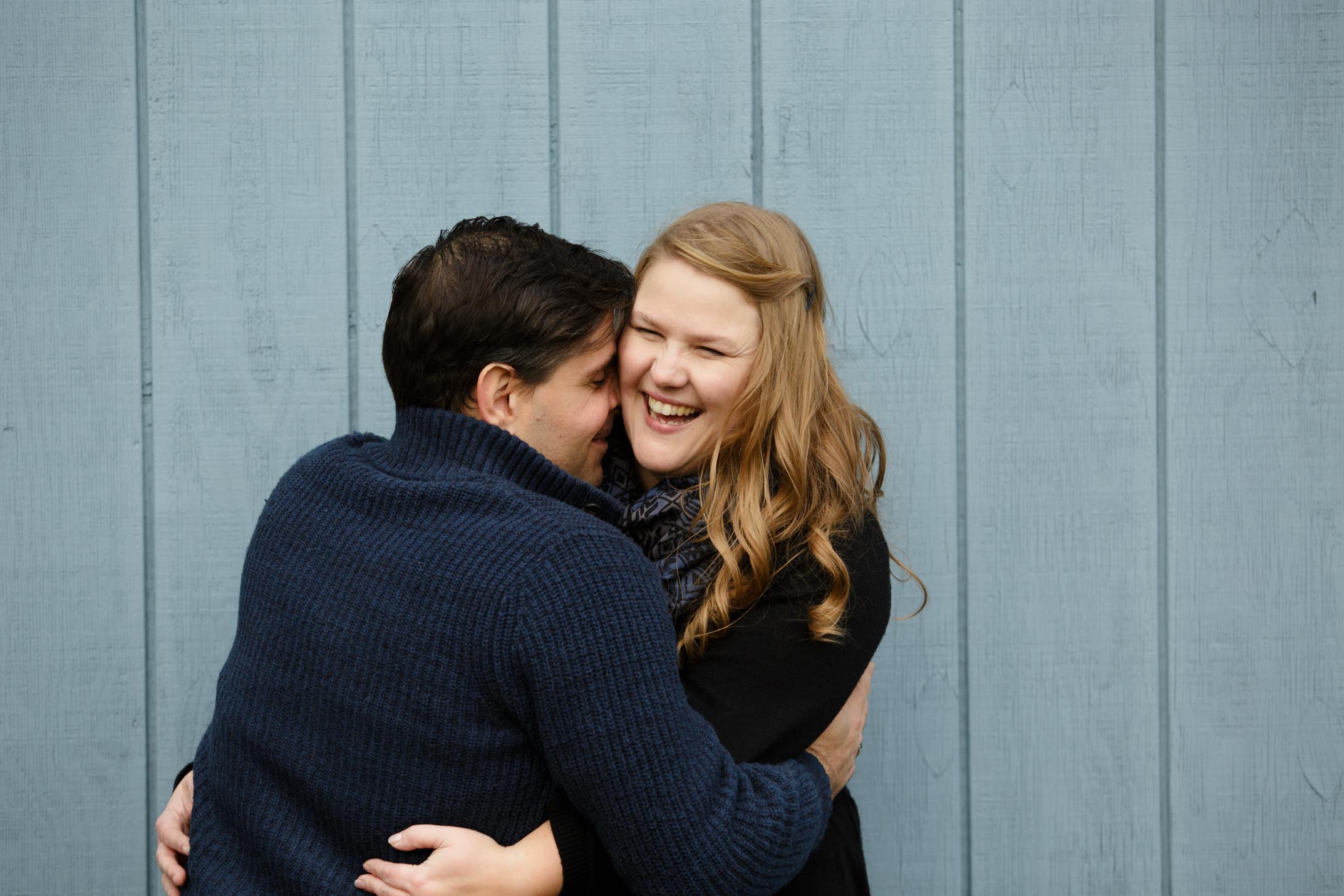 Laura + Jimmy Hug Blue wall